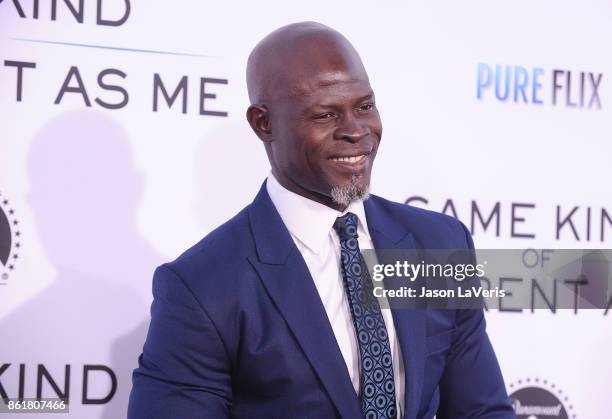 Actor Djimon Hounsou attends the premiere of "Same Kind of Different as Me" at Westwood Village Theatre on October 12, 2017 in Westwood, California.