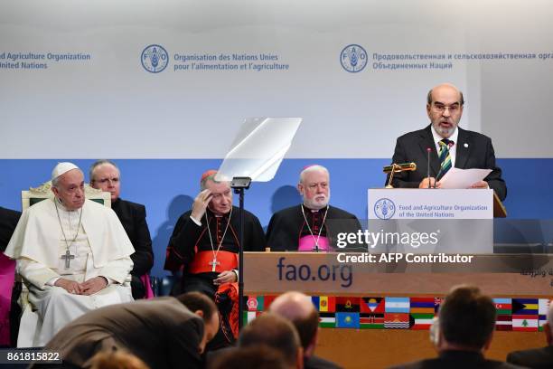 Pope Francis listens to FAO general director José Graziano da Silva, during a meeting at the Food and Agriculture Organization headquarters, on...