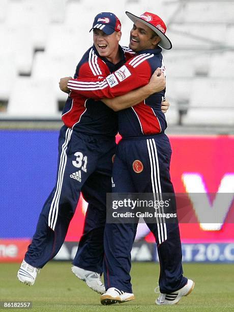 David Warner and Virender Sehwag celebrate during the IPL T20 match between Chennai Super Kings and Delhi Daredevils from Sahara Park on April 23,...