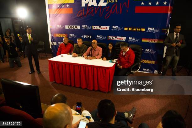 Diosdado Cabello, vice president of the United Socialist Party, seated from left, Tareck El Aissami, vice president of Venezuela, Jorge Rodriguez,...