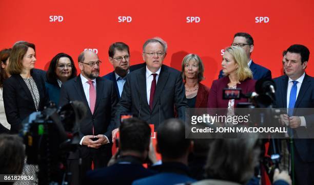 Lower Saxony's State Premier Stephan Weil , winner of regional elections in his northwestern federal state, speaks during a meeting at the...