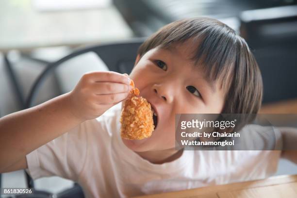 enjoy eating - chewing with mouth open stock pictures, royalty-free photos & images