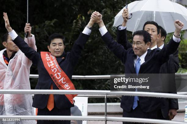 Hideki Makihara, a member of the Liberal Democratic Party , second from left, and Fumio Kishida, chairman of the Policy Research Council at the LDP...