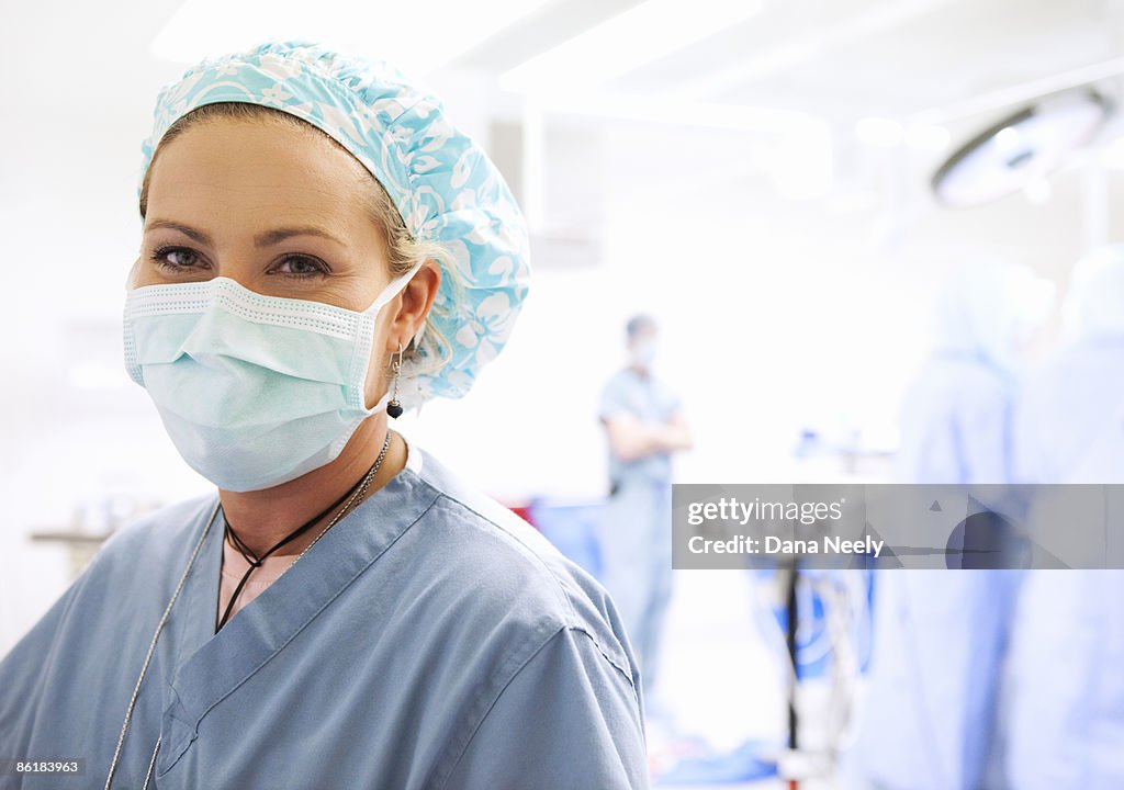 Nurse circulator in operating room, portrait      