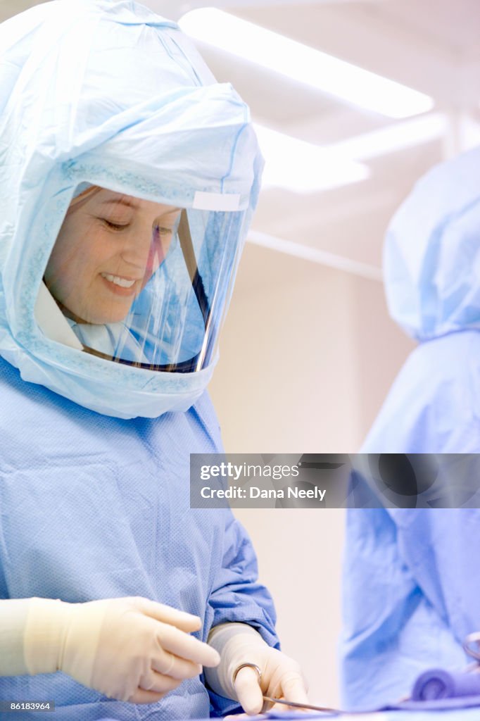 Passing Instruments Scrub Tech Passing Instruments During Surgery High-Res Stock Photo ...