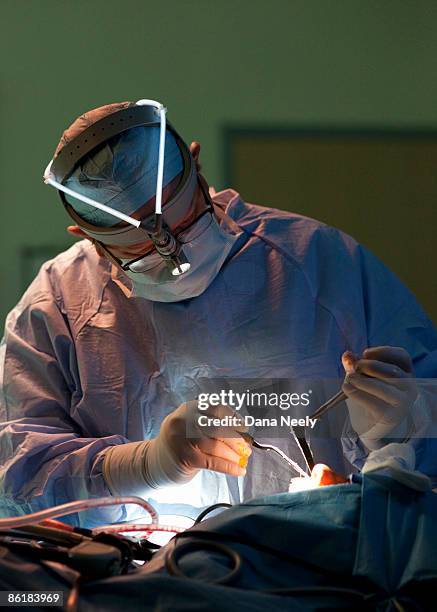 doctor operating on patient in or, septoplasty - nose mask fotografías e imágenes de stock