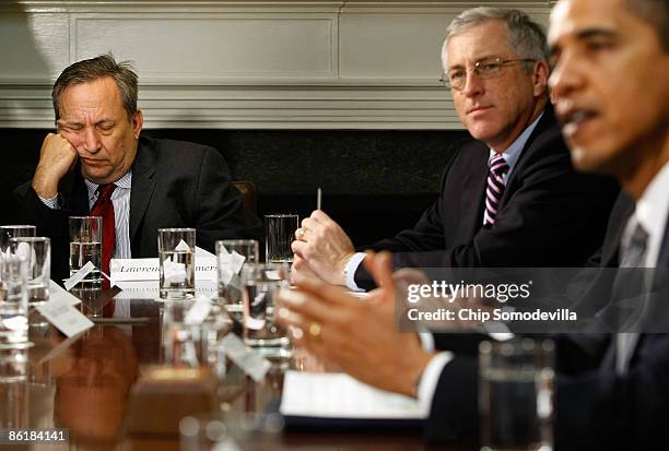 White House National Economic Council Director Larry Summers nods off while U.S. President Barack Obama talks to the press after a meeting with...