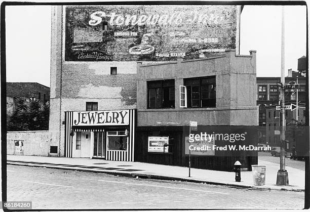 Exterior view of a building on Sheridan Square that, according to the sign, will be the home of the Village Voice newspaper, New York, New York,...