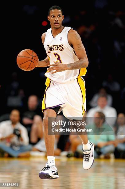 Trevor Ariza of the Los Angeles Lakers drives the ball up court in Game One of the Western Conference Quarterfinals against the Utah Jazz during the...