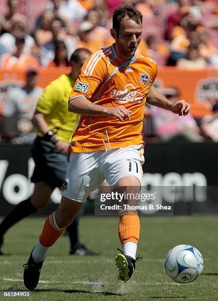 Brad Davis of the Houston Dynamo dribbles the ball against the Colorado Rapids at Robertson Stadium on April 19, 2009 in Houston, Texas.