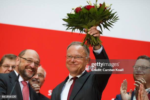 Martin Schulz , head of the German Social Democrats , congrats Stephan Weil, incumbent SPD candidate in yesterday's state elections in Lower Saxony,...