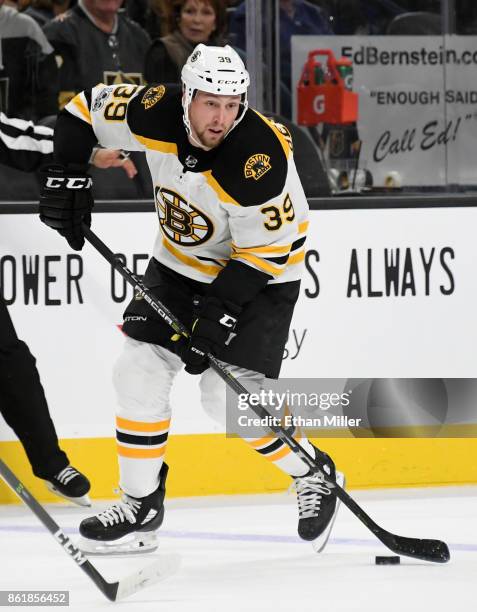 Matt Beleskey of the Boston Bruins skates with the puck against the Vegas Golden Knights in the third period of their game at T-Mobile Arena on...