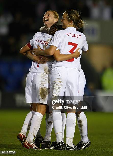 Scorer of the second goal Lindsay Johnson of England celebrates with team mates after Fara Williams has scored the third goal during the Women's...