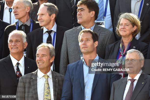 French astronauts Thomas Pesquet of European Space Agency and Jean-François Clervoy pose for pictures along with other astronauts during the 30th...