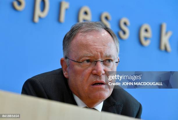 Lower Saxony's State Premier Stephan Weil, winner of regional elections in his northwestern federal state, addresses a press conference in Berlin, on...