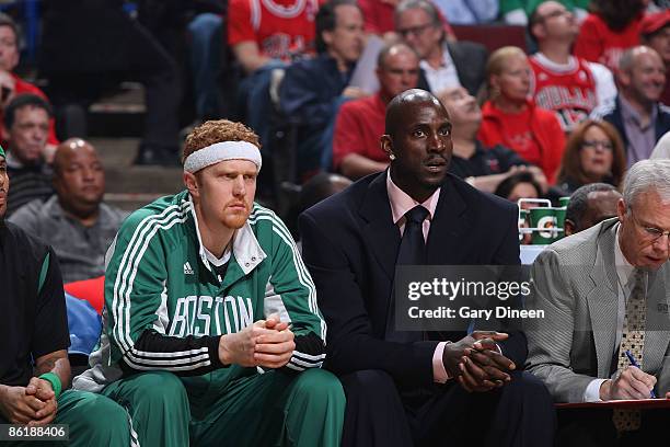Brian Scalabrine and Kevin Garnett of the Boston Celtics watch action from the bench during the NBA game against the Chicago Bulls in Game Three of...