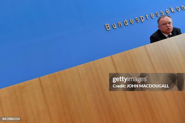 Lower Saxony's State Premier Stephan Weil, winner of regional elections in his northwestern federal state, addresses a press conference in Berlin, on...