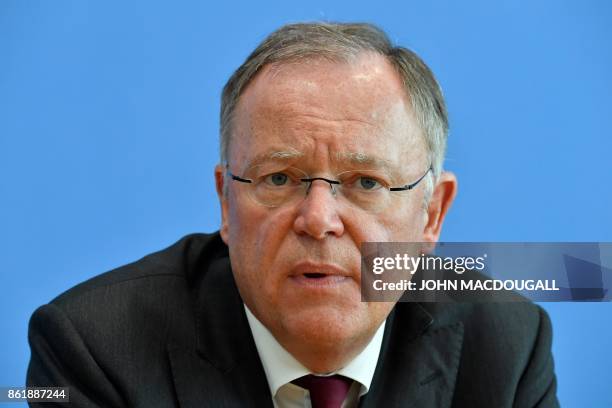 Lower Saxony's State Premier Stephan Weil, winner of regional elections in his northwestern federal state, addresses a press conference in Berlin, on...