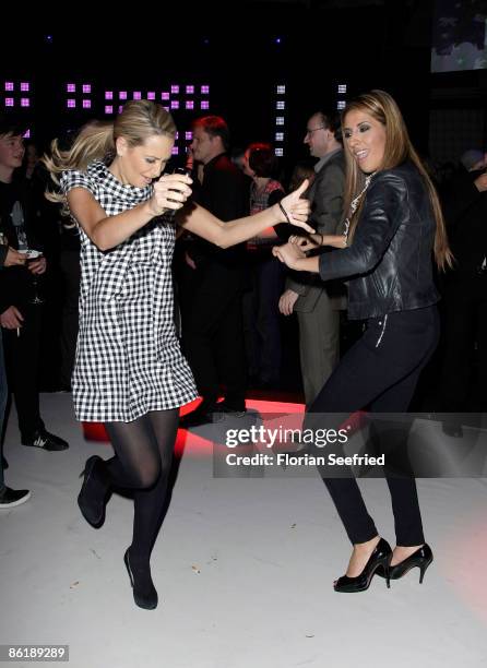 Singer of the band monrose Mandy Grace Capristo and singer Senna Guemmour attend the 'new faces award 2009' at BCC on April 23, 2009 in Berlin,...