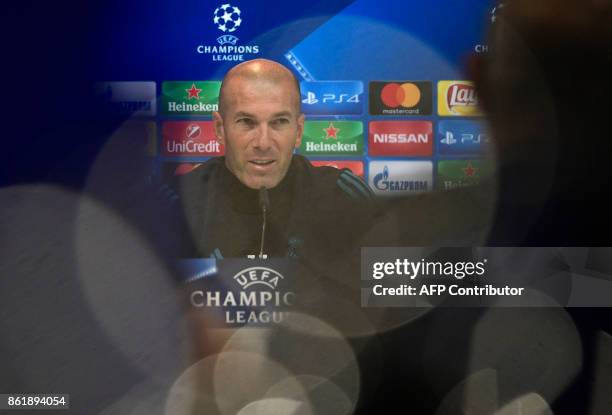 Real Madrid's French coach Zinedine Zidane gives a press conference after a training session at Valdebebas Sport City in Madrid on October 16, 2017...