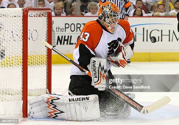 Martin Biron of the Philadelphia Flyers makes a save against the Pittsburgh Penguins during Game Five of the Eastern Conference Quarterfinals of the...