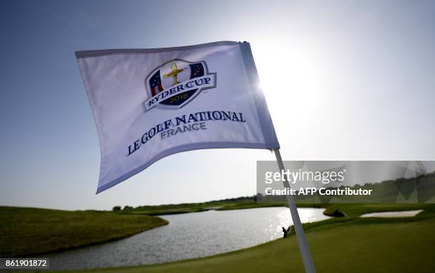 The Ryder Cup's flag is seen during the 2018 Ryder Cup media day on october 16, 2017 at the Golf National in Guyancourt, near Paris, the venue of the...