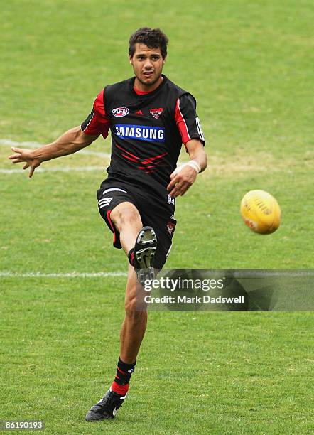 Patrick Ryder of the Bombers practices his goal kicking during the Essendon Bombers AFL training session at Windy Hill on April 24, 2009 in...