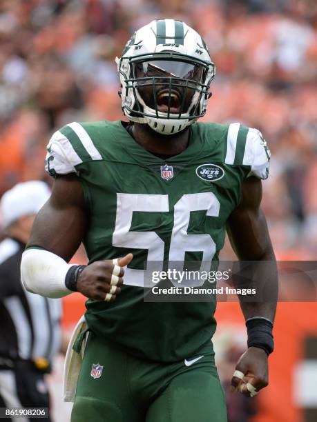 Linebacker Demario Davis of the New York Jets celebrates a third down stop as he runs toward the sideline in the fourth quarter of a game on October...