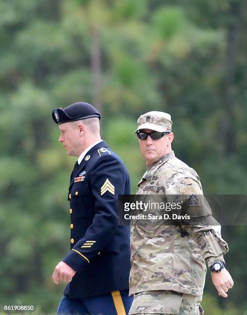 Army Sgt. Robert Bowdrie "Bowe" Bergdahl , 31 of Hailey, Idaho, is escorted into the Ft. Bragg military courthouse for a motions hearing on October...