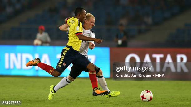 Dennis Jastrzembski of Germany battles with Andres Cifuentes of Colombia during the FIFA U-17 World Cup India 2017 Round of 16 match between Colombia...