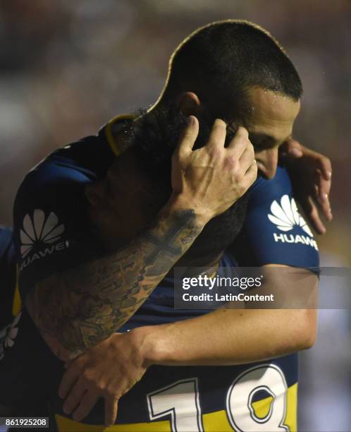 Dario Benedetto of Boca Juniors celebrates with teammate Frank Fabra after scoring the second goal of his team during a match between Patronato and...