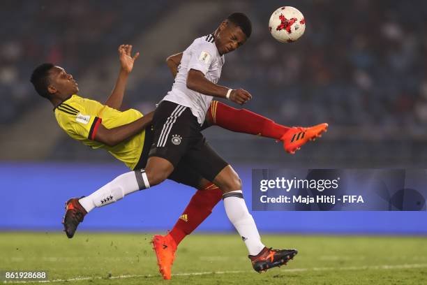 Guillermo Tegue of Colombia and Jessic Ngankam of Germany battle for the ball during the FIFA U-17 World Cup India 2017 Round of 16 match between...