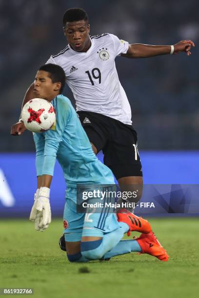 Kevin Mier of Colombia and Jessic Ngankam of Germany battle for the ball during the FIFA U-17 World Cup India 2017 Round of 16 match between Columbia...