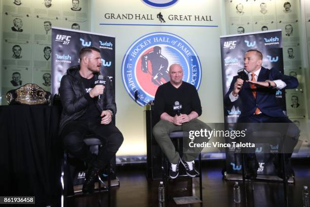 Middleweight champion Michael Bisping goes nose to nose with Canadian Georges St-Pierre in Friday's UFC 217 teaser at the Hockey Hall of Fame.