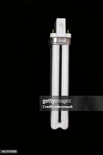 fluorescent bulb - fluorescent light stock pictures, royalty-free photos & images