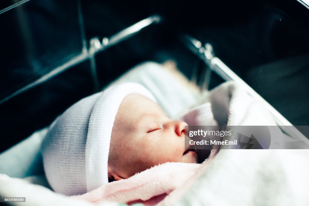 Newborn in the hospital nursery