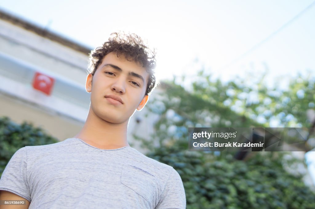 Portrait of Handsome teen boy outdoors