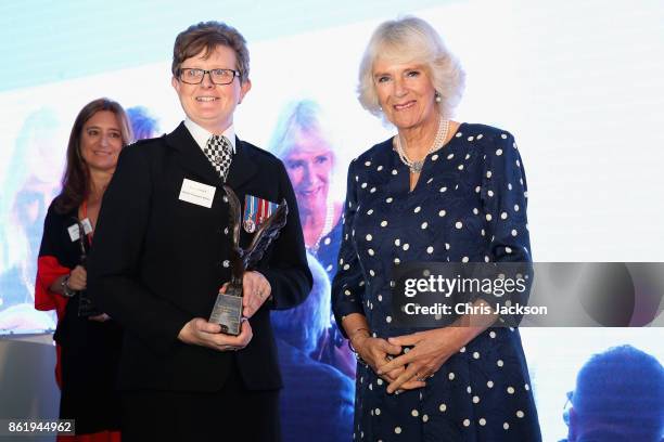 Camilla, Duchess of Cornwall and Cath Daley at the annual Women of the Year lunch at Intercontinental Hotel on October 16, 2017 in London, England.