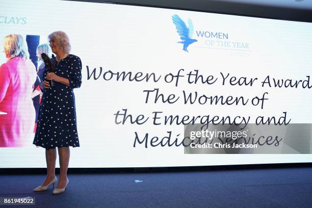 Camilla, Duchess of Cornwall on stage at the annual Women of the Year lunch at Intercontinental Hotel on October 16, 2017 in London, England.