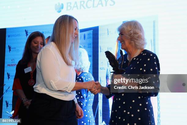Camilla, Duchess of Cornwall and Laura Prescott at the annual Women of the Year lunch at Intercontinental Hotel on October 16, 2017 in London,...