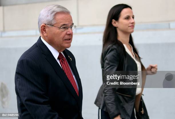 Senator Robert Menendez, a Democrat from New Jersey, left, arrives at federal court in Newark, New Jersey, U.S., Monday, Oct. 16 2017. Menendez is...