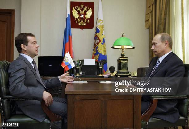 Russian President Dmitry Medvedev meets with Prime Minister Vladimir Putin at the presidential hunting lodge some 150 kms north of Moscow in Zavidovo...