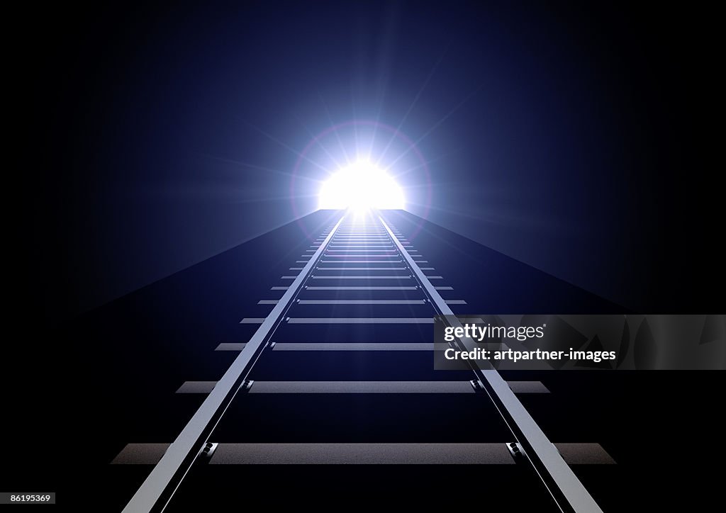 Rails or tracks leading to a light