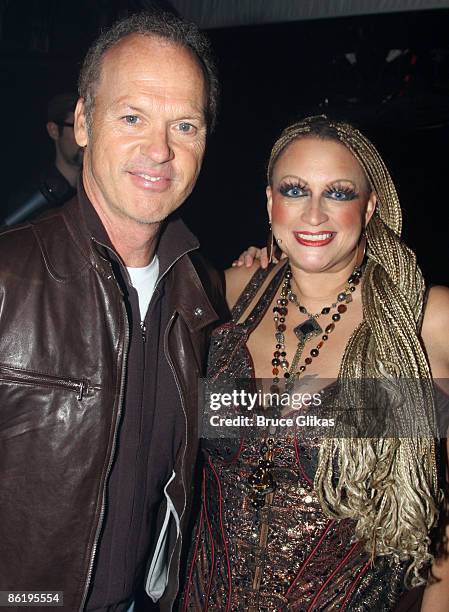 Michael Keaton and Michele Mais pose backstage at "Rock of Ages" on Broadway at The Brooks Atkinson Theater on April 23, 2009 in New York City.