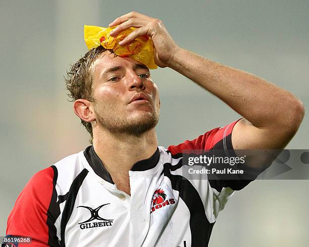 Robert Kruger heads from the field after being defeated during the round 11 Super 14 match between the Western Force and the Lions at Subiaco Oval on...