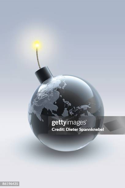 globe shown as a bomb with fuze light - fuse stock illustrations