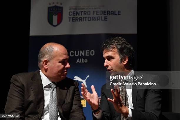 General Director Michele Uva talks with Alessandro D Este during as the Italian Football Federation Unveils New Regional Federal Training Center at...