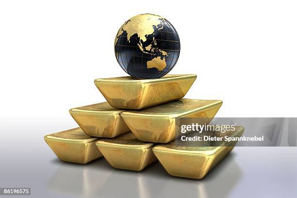 globe on a pyramid of gold bars - stacked gold bars stock illustrations