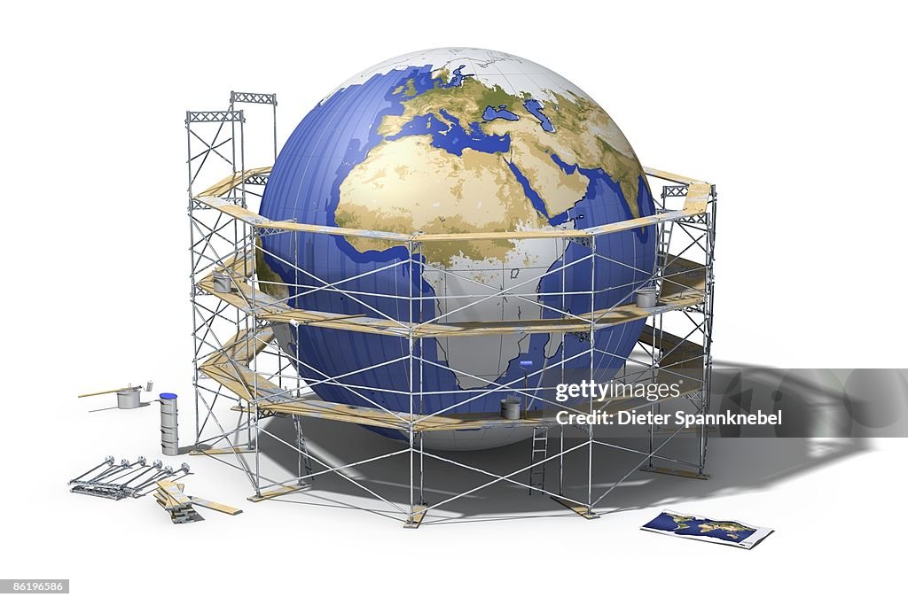 Depainted globe circled by a scaffolding
