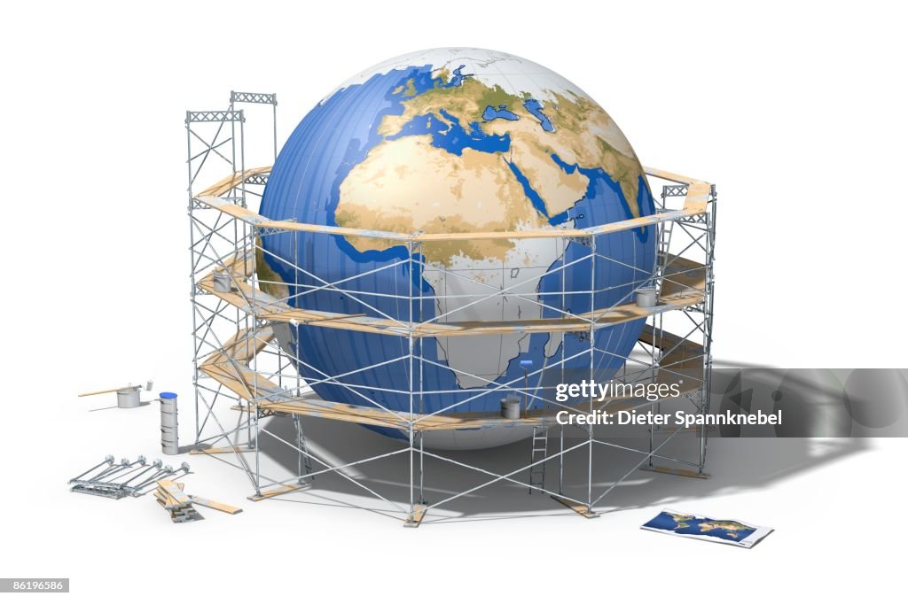 Depainted globe circled by a scaffolding